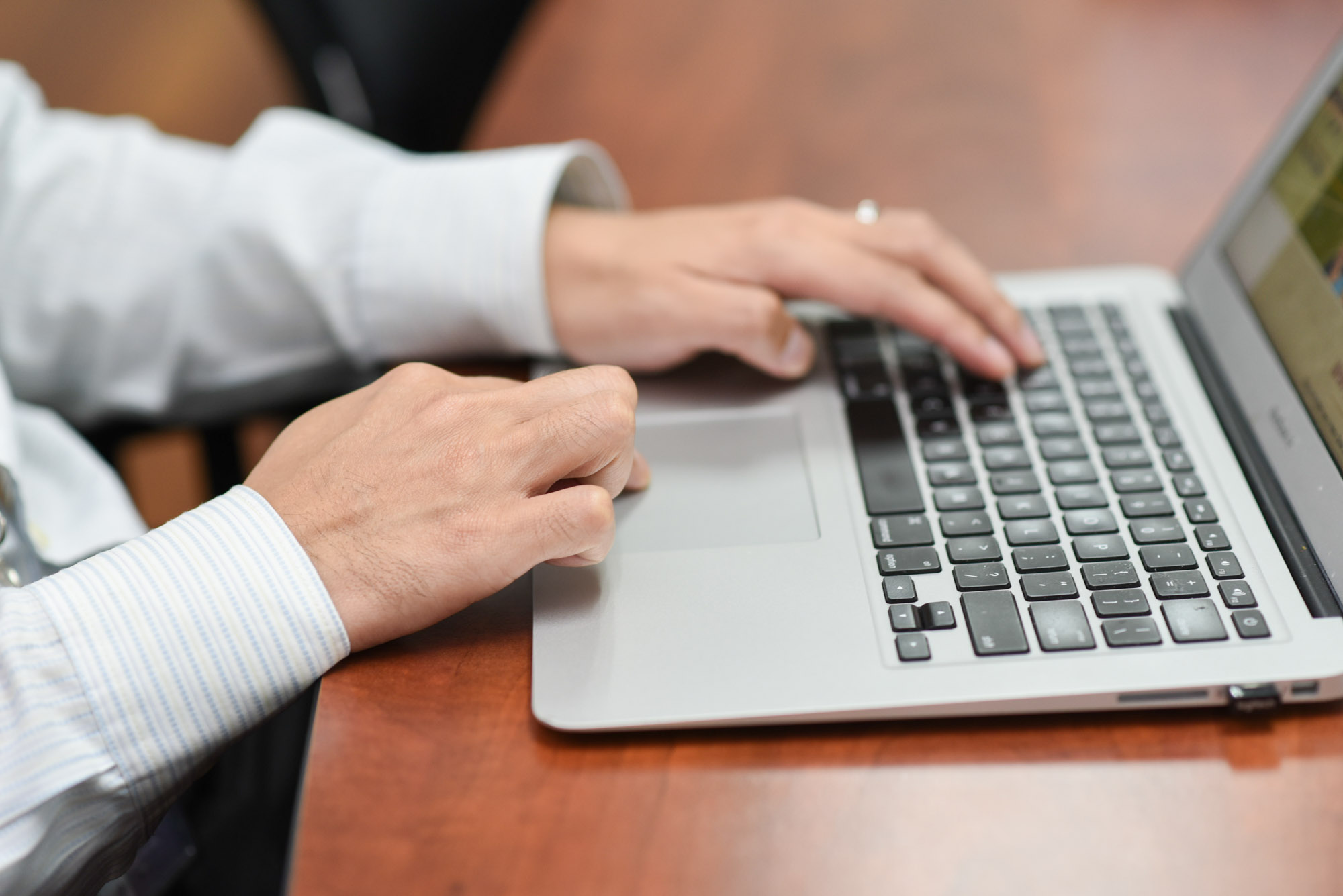 a guy using the laptop