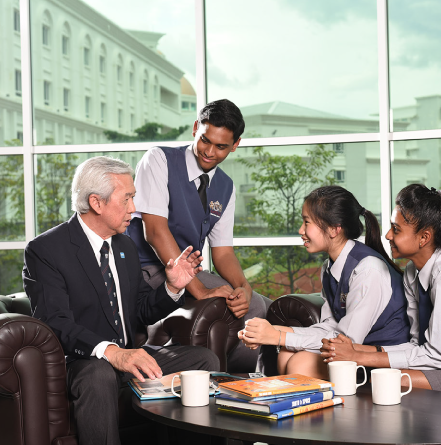 Teacher discussing with students